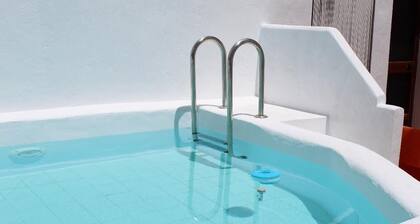 Stay Poolside in a Ronda two bed house with private roof terrace.