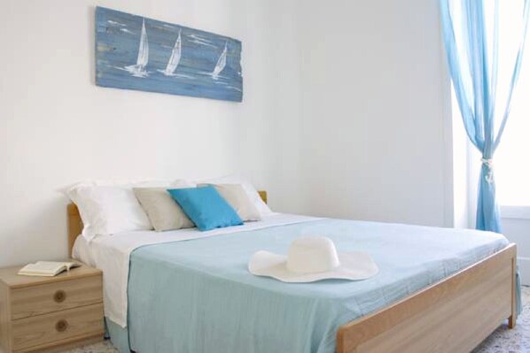 1 bedroom, desk, iron/ironing board, bed sheets