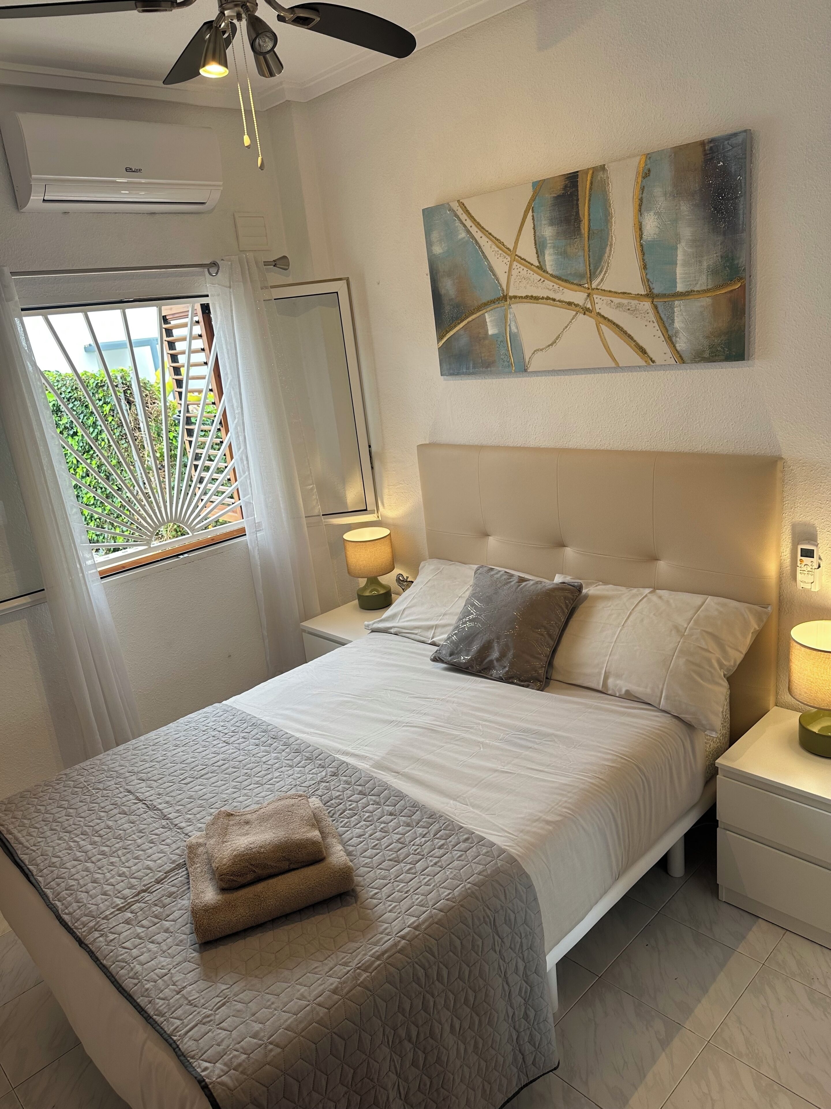 2 dormitorios, tabla de planchar con plancha, wifi gratis y ropa de cama