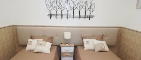 2 bedrooms, desk, iron/ironing board, travel cot