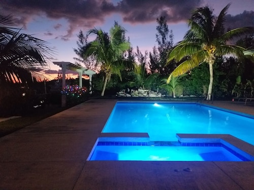 14ft Centre consul boat and car included Waterfront property with pool.