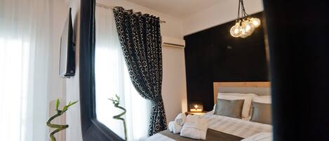 3 camere, una cassaforte in camera, una scrivania, ferro/asse da stiro