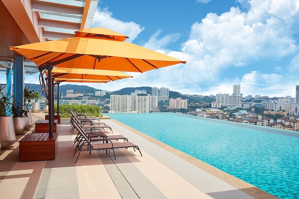 Outdoor pool, open 7:00 AM to 9:00 PM, pool umbrellas, pool loungers