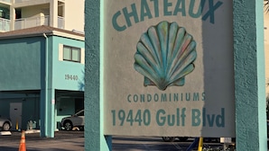A sign for The Chateau Condominiums at 19440 Gulf Blvd. - Beautiful Beachfront Getaway retreat for couples, Private Balcony & Sunsets #202 (Indian Shores)