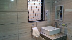 Hair dryer, towels, soap, toilet paper