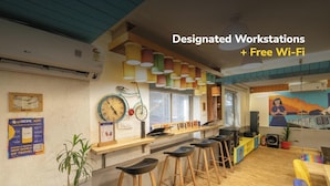 A modern workspace with designated workstations and free Wi-Fi. - goSTOPS Delhi (New Delhi)