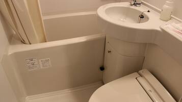 Combined shower/tub, deep soaking tub, free toiletries, hair dryer