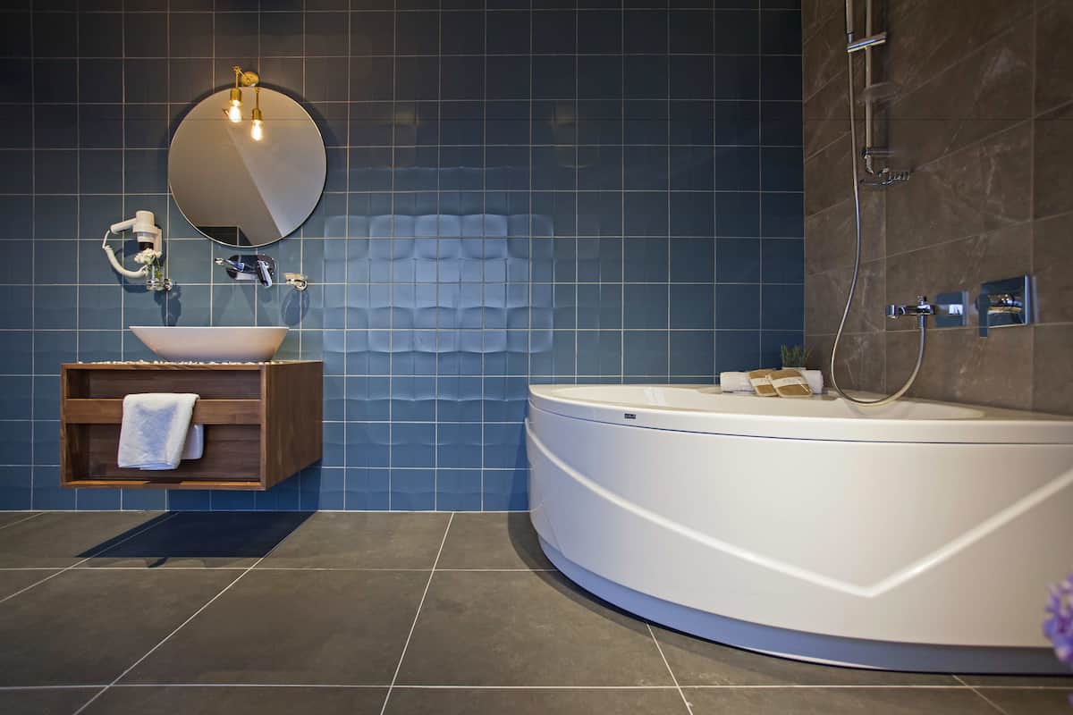 junior suite, non smoking, city view | deep-soaking bathtub