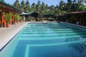 2 outdoor pools, pool umbrellas, pool loungers