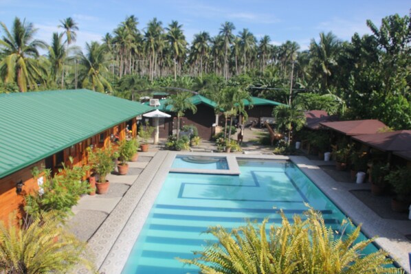 2 outdoor pools, pool umbrellas, sun loungers