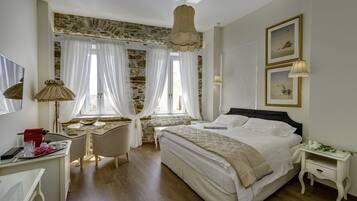 Premium bedding, memory foam beds, free minibar, in-room safe