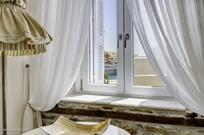 Superior Suite, Partial Sea View | 1 bedroom, premium bedding, memory-foam beds, free minibar