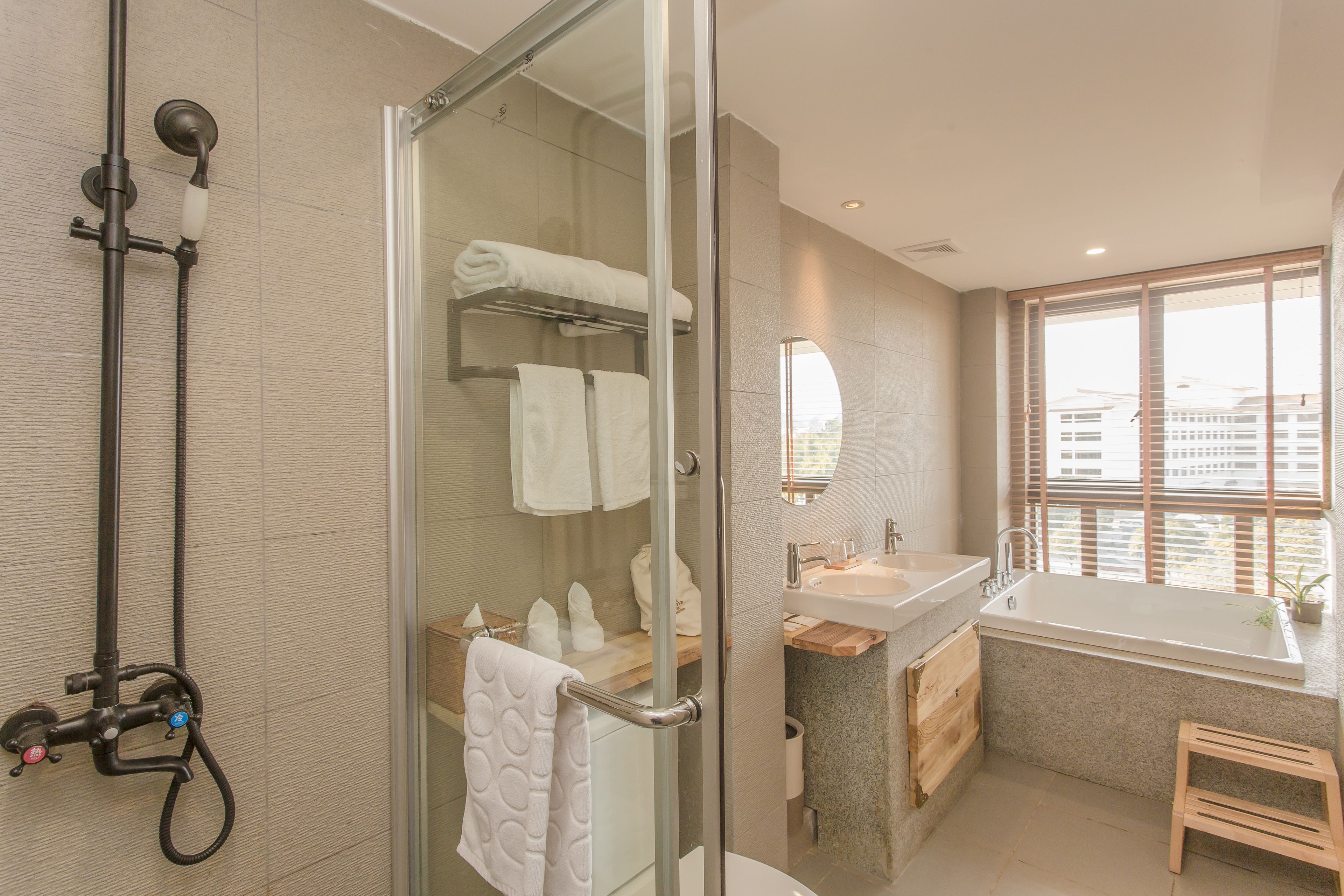 deluxe queen room with bathub | bathroom | separate bathtub and shower, rainfall showerhead, free toiletries