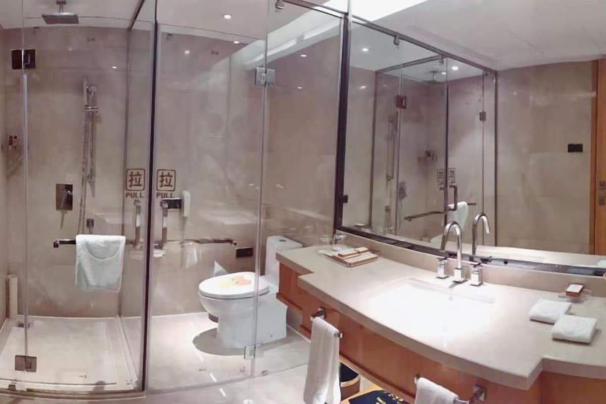 Bathroom | Separate tub and shower, free toiletries, hair dryer, bathrobes