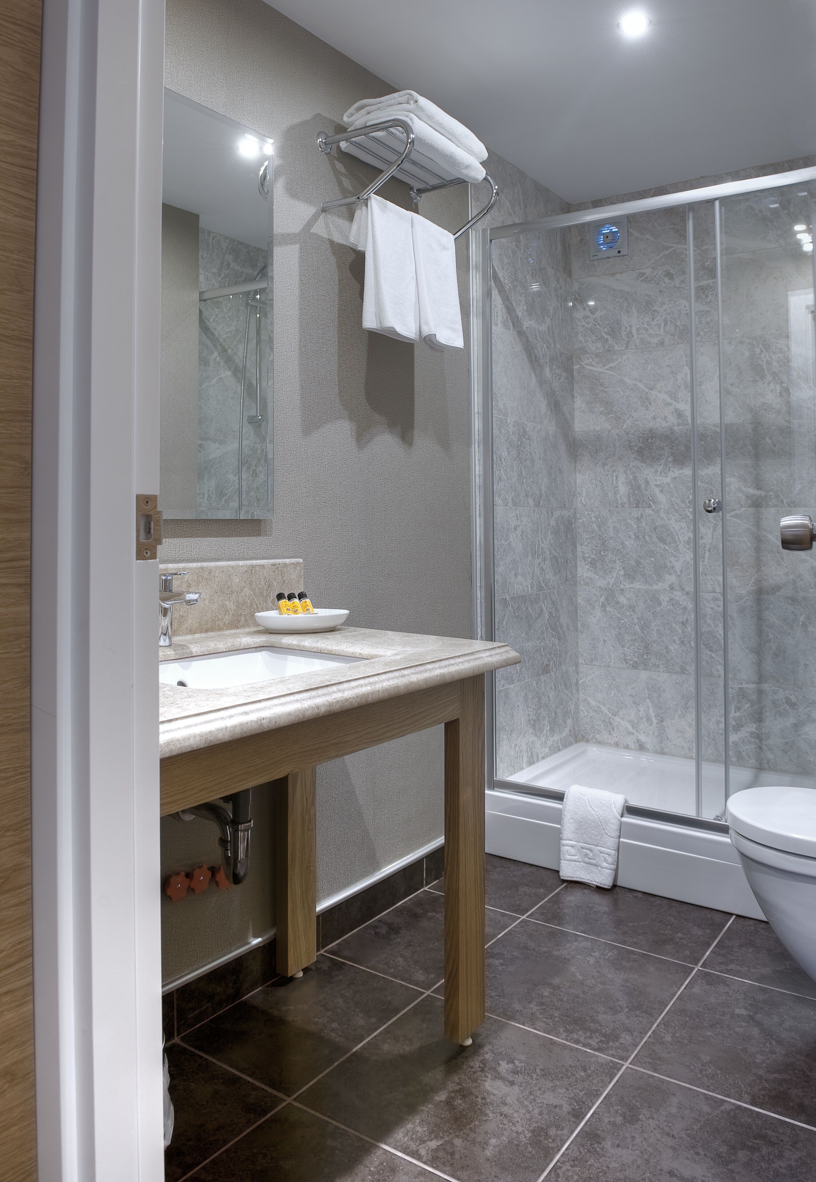 shower, free toiletries, slippers, towels