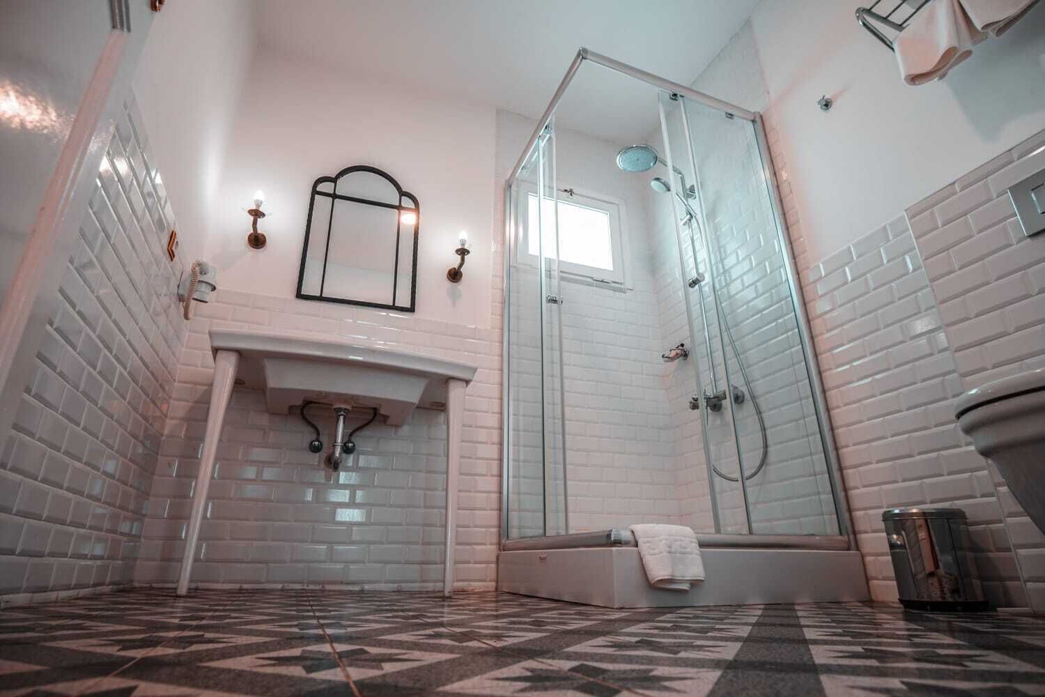 shower, free toiletries, slippers, towels