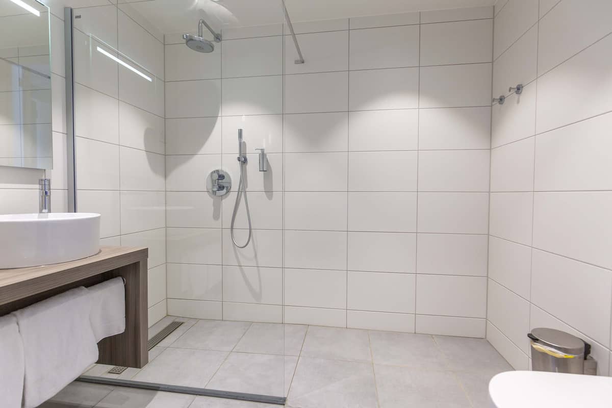 shower, eco-friendly toiletries, hair dryer, towels