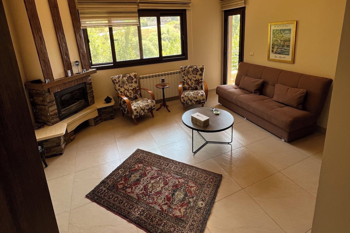 Deluxe Apartment, 1 Bedroom | Living area | 32-inch LCD TV with satellite channels, TV