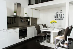 Fridge, microwave, oven, stovetop - Ricci Apartments (Prague)