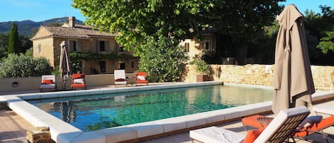 Outdoor pool, pool umbrellas, sun loungers