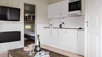 Family Cottage (Excluding Towels, Sheets and Cleaning) | Private kitchen | Fridge, stovetop, dishwasher, coffee/tea maker