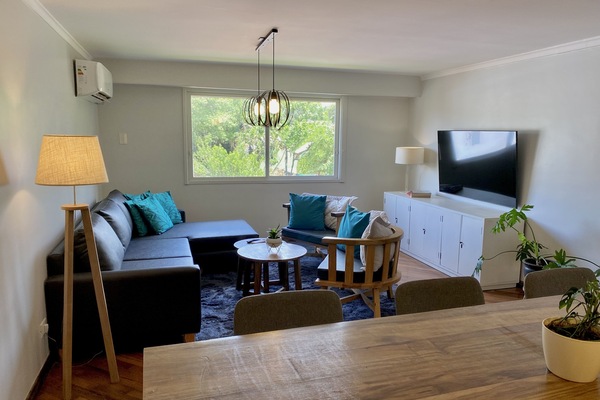 Family Apartment, 3 Bedrooms, Garden View | Living area | 43-inch flat-screen TV with cable channels, LED TV