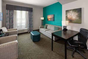 Suite, 1 très grand lit, non-fumeurs | Surmatelas, bureau, espace de travail pour ordinateur portable