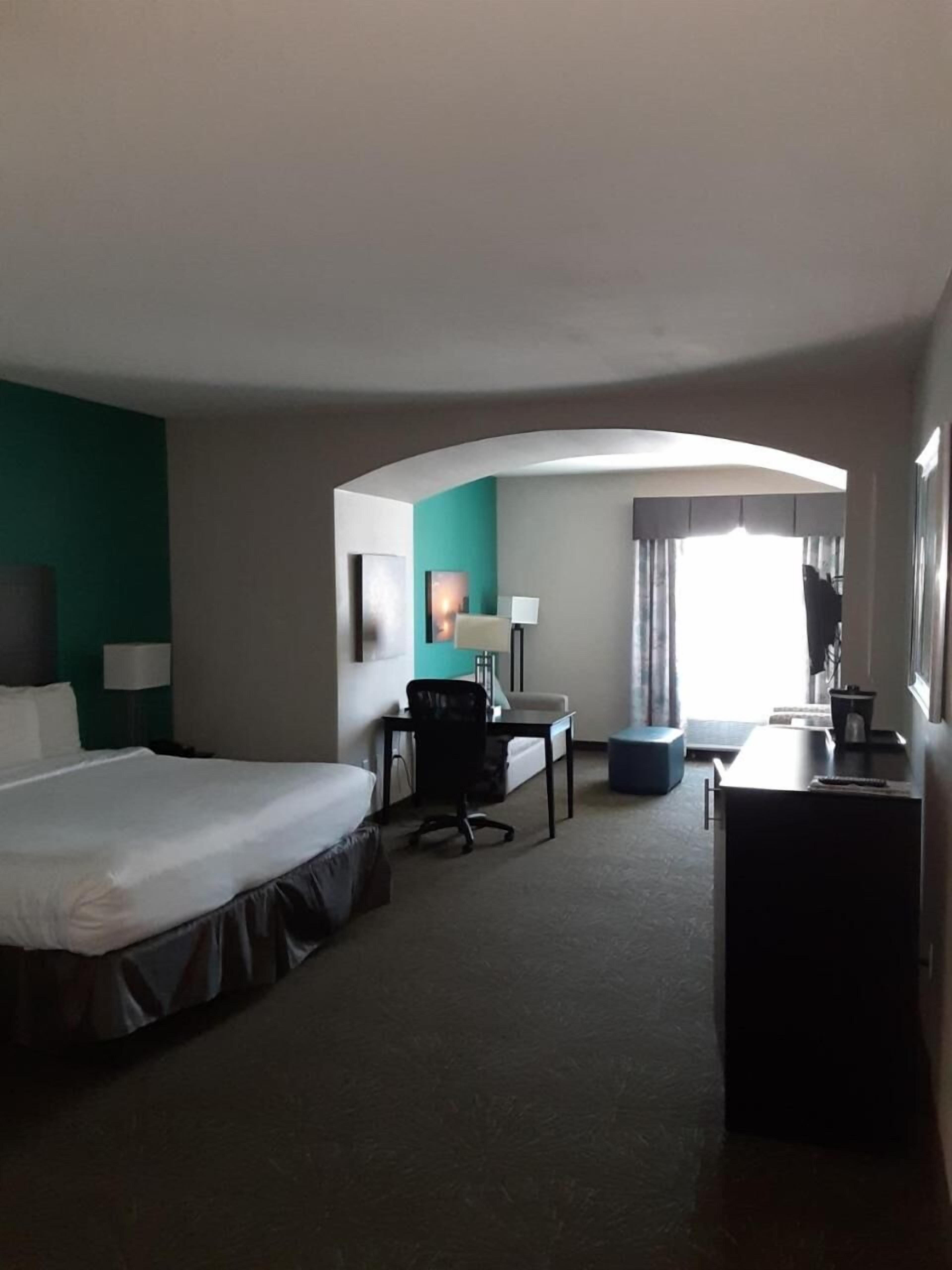 Pillow-top beds, desk, laptop workspace, free rollaway beds