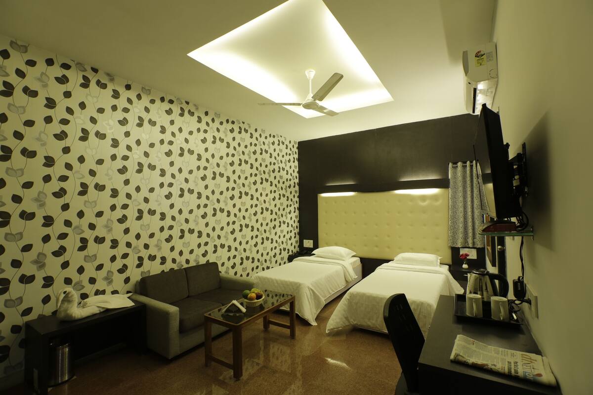 Family Double Room, Non Smoking, Partial Sea View | In-room safe, desk, iron/ironing board, free rollaway beds