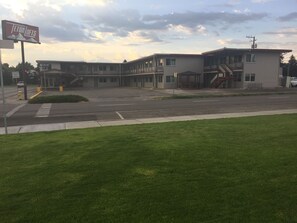 A two-story building with a flat roof and a sign that reads "Teton Lofts". - Teton Lofts (Idaho Falls)