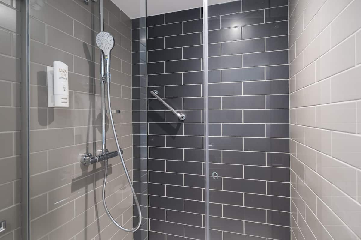 shower, eco-friendly toiletries, hair dryer, towels