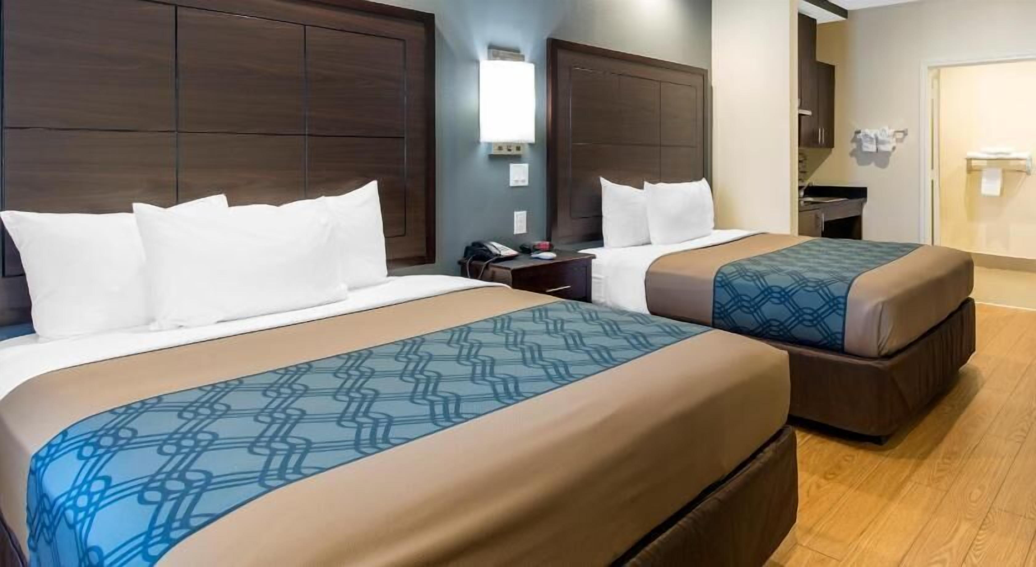 Premium bedding, desk, iron/ironing board, rollaway beds