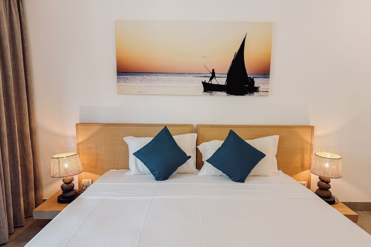 Apartment, 3 Bedrooms, Pool View | In-room safe, individually furnished, laptop workspace, blackout drapes