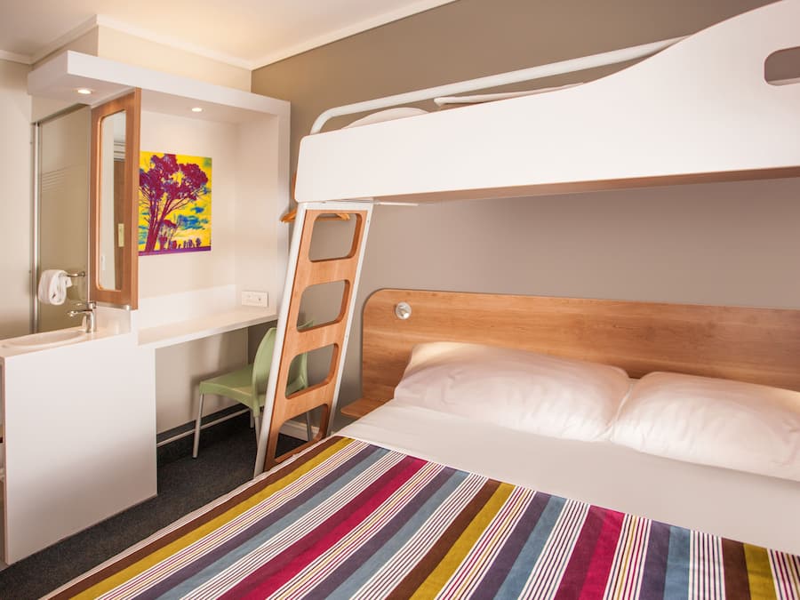 Desk, laptop workspace, free WiFi, bed sheets