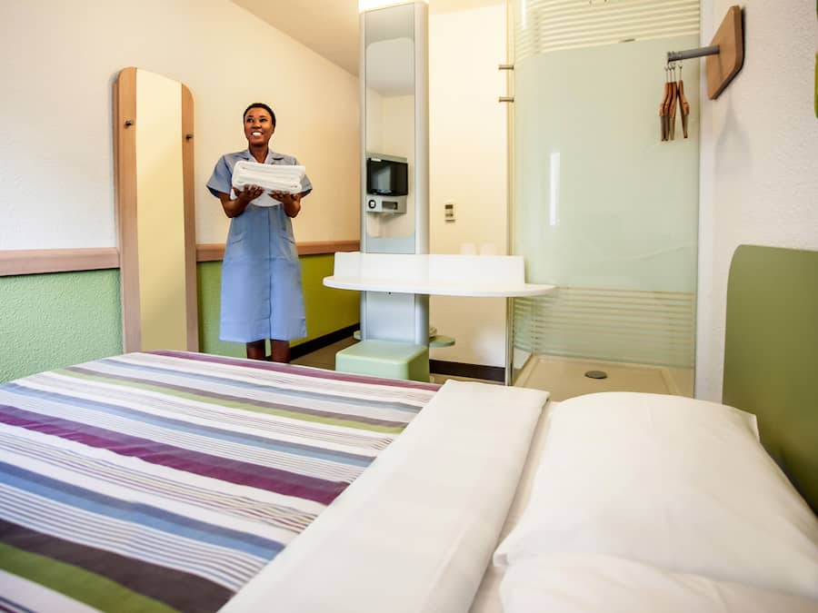 Standard Double Room, Non Smoking (Queen with separate bunk bed) | Living area | TV