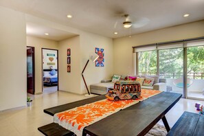 Apartment, 2 Bedrooms, Kitchen, Pool View | Living area | Flat-screen TV