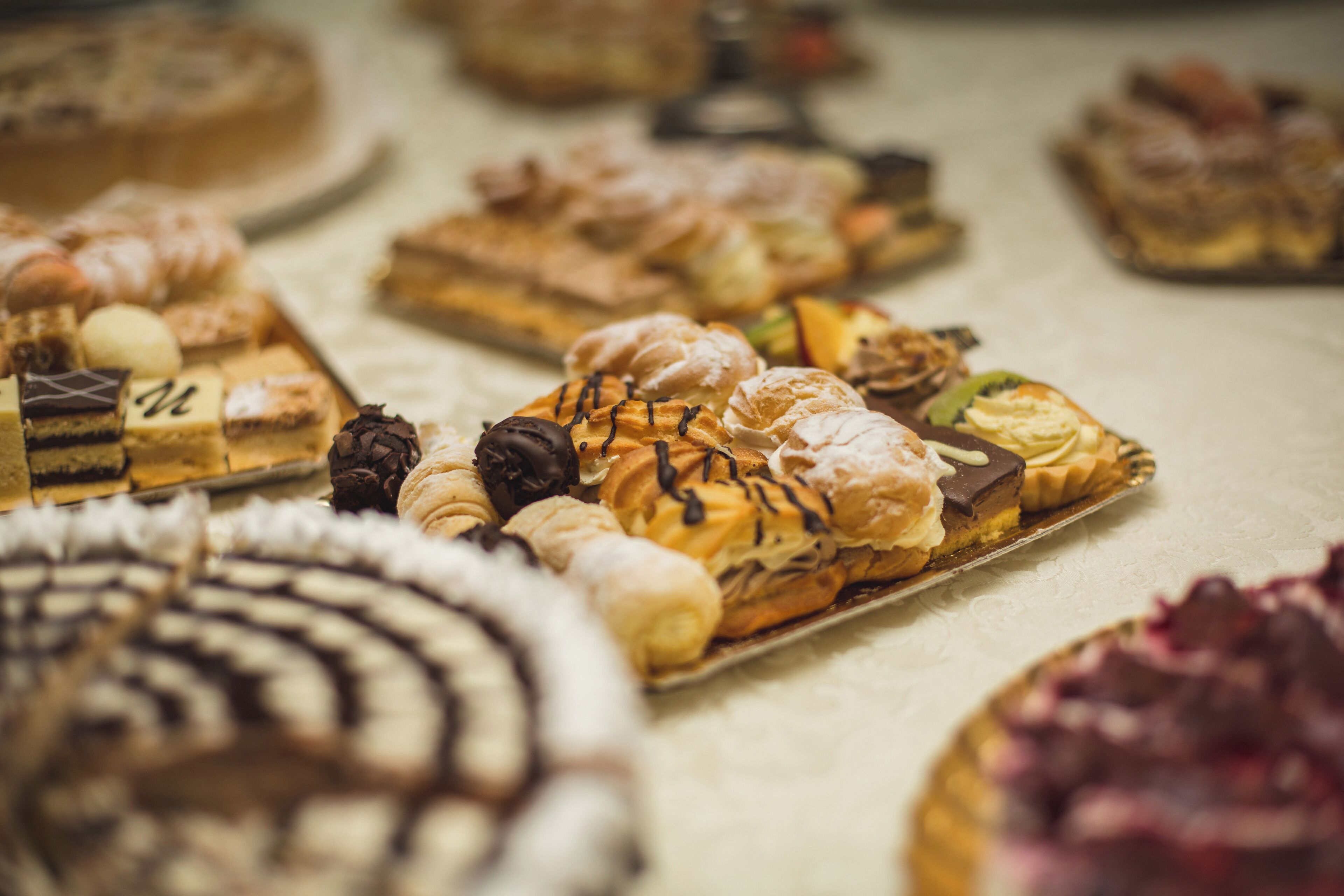 A variety of pastries and desserts on display.