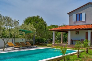 Outdoor pool - Modern house in a quiet location with a fenced garden, porch and private pool (Marcana)