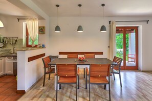 Dining - Modern house in a quiet location with a fenced garden, porch and private pool (Marčana)