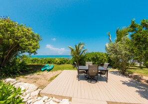 Outdoor dining - Corktree Beach House - Modern, Beachfront 2bd/3ba home with central AC (Grand Turk)