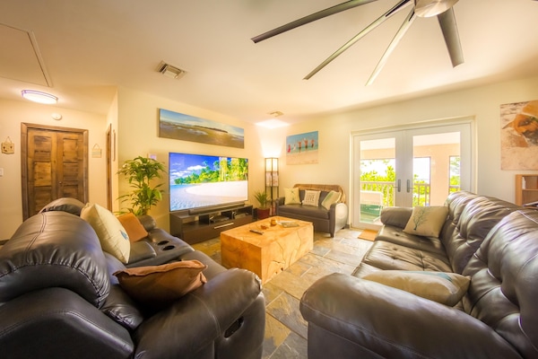 Cozy Living Room with Satellite TV