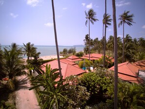 On the beach, sun loungers, beach towels