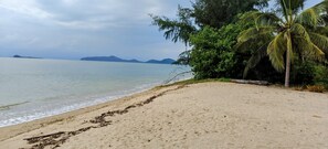 On the beach, sun loungers, beach towels