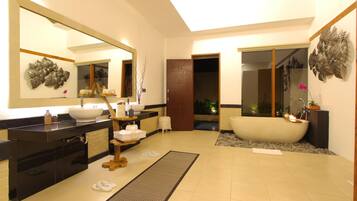 Bathtub, hair dryer, towels