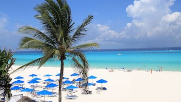 Espreguiçadeiras, toalhas de praia