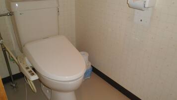 Japanese-style Economy Room | Bathroom | Hair dryer, electronic bidet, towels