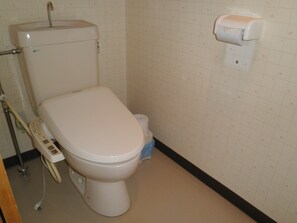 Japanese-style Economy Room | Bathroom | Hair dryer, electronic bidet, towels