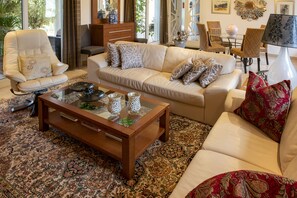Flat-screen TV, video games, DVD player, books