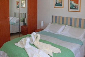 2 dormitorios, caja fuerte, tabla de planchar con plancha y wifi gratis