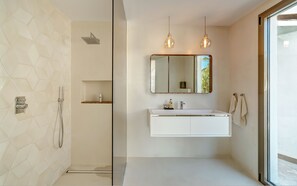 Combined shower/tub, hair dryer, towels, soap - Stylish 300 m2 Pool Villa with Stunning Seaview in Exclusive Residential Area  (Costa d'en Blanes)